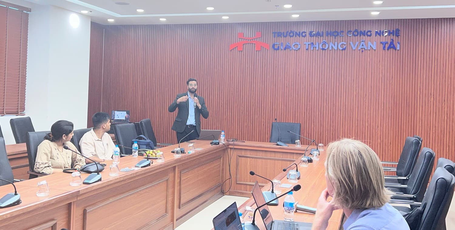 Technical presentation in a meeting room during the Day 2 afternoon session