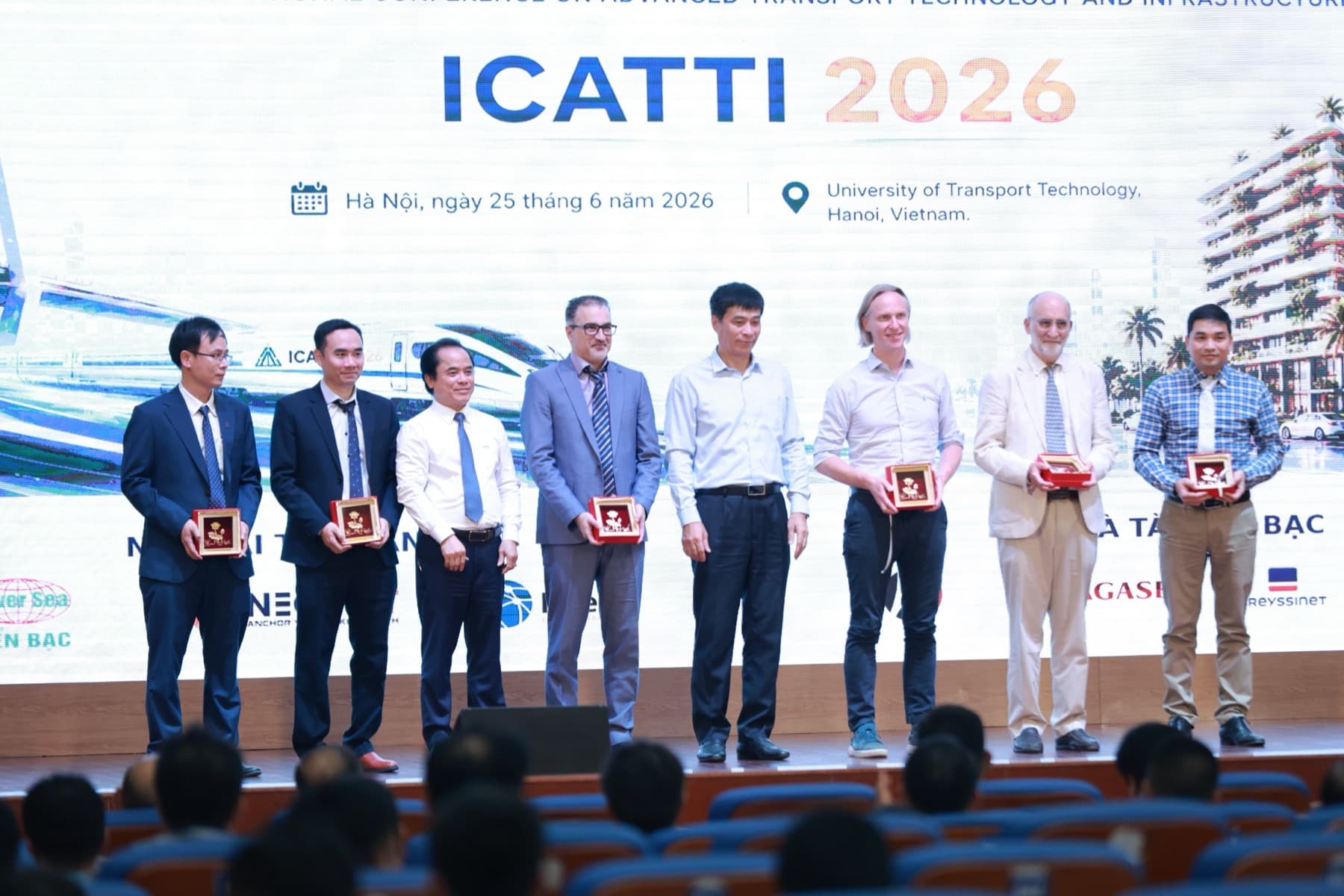 ICATTI 2026 recognition moment with speakers and partners receiving certificates
