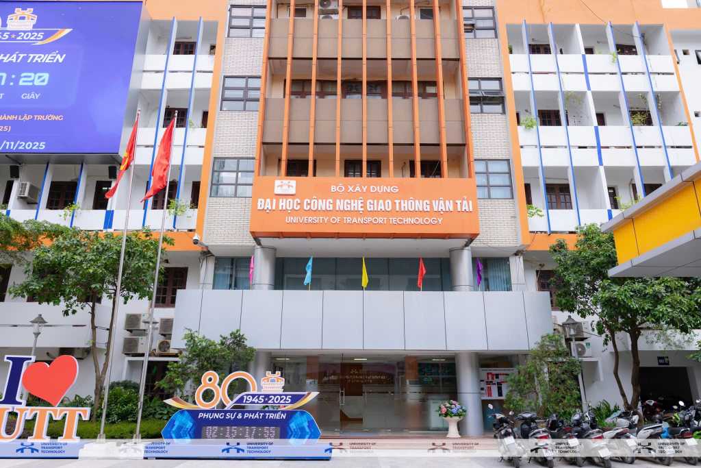 UTT main campus building with 80th anniversary celebration banner (1945–2025)